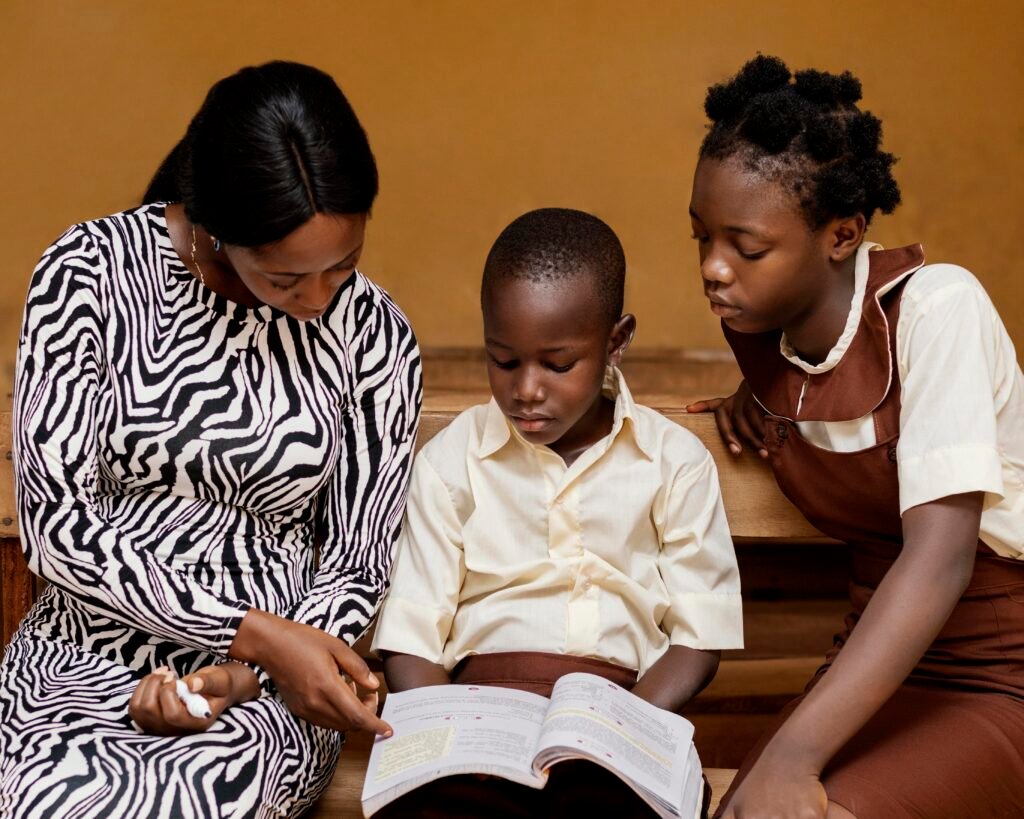 african woman teaching kids class
